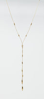 Long Gold Necklance With Golden Beads Throughout and Long Golden Tassle