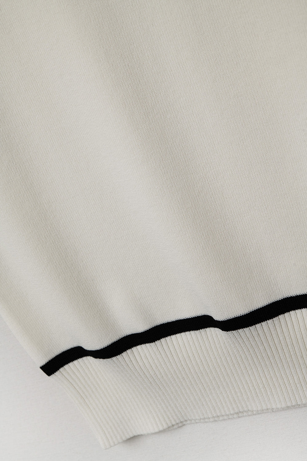 Top in White Featuring Black Lines